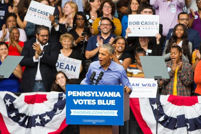 Former President Barack Obama exhorts the crowd to vote on Nov. 6. (Kimberly Paynter/WHYY)