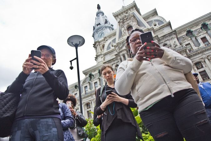 Women and allies gathered in Center City Philadelphia tweet at Iowa senator Chuck Grassley and Pa. senator Daylin Leach as part of a national walkout to show support for Christine Blasey Ford and Deborah Ramirez, two women who claim Supreme Court Judge nominee Brett Kavanaugh sexually assaulted them. (Kimberly Paynter/WHYY)