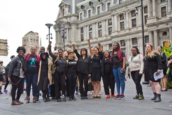 Women and allies gathered in Center City Philadelphia as part of a national walkout to show support for Christine Blasey Ford and Deborah Ramirez, two women who claim Supreme Court Judge nominee Brett Kavanaugh assaulted them. (Kimberly Paynter/WHYY)