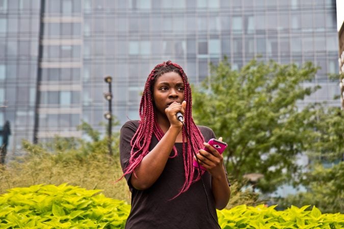 Blessing Osazuwa shares her experiences with rape and sexual assault as part of a national walkout to show support for Christine Blasey Ford and Deborah Ramirez, two women who claim Supreme Court Judge nominee Brett Kavanaugh assaulted them. (Kimberly Paynter/WHYY)