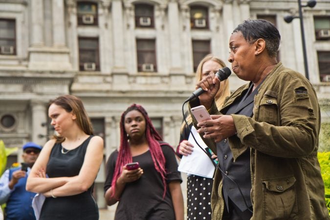 Tonya Bah shares her experiences with rape and sexual assault as part of a national walkout to show support for Christine Blasey Ford and Deborah Ramirez, two women who claim Supreme Court Judge nominee Brett Kavanaugh assaulted them. (Kimberly Paynter/WHYY)