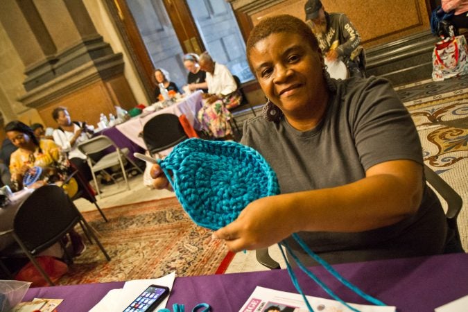 Lillian Wilburn attends the Knit In every year and loves the new tips and patterns she learns at the event. (Kimberly Paynter/WHYY)