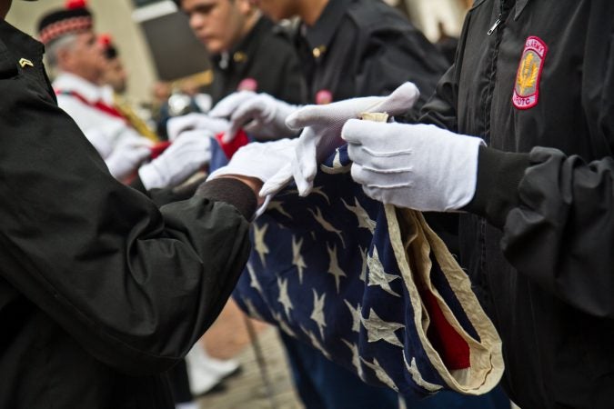 The Frankford ROTC performs the flag folding ceremony. (Kimberly Paynter/WHYY)