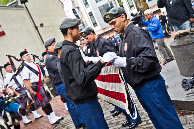 The Frankford ROTC performs the flag folding ceremony. (Kimberly Paynter/WHYY)