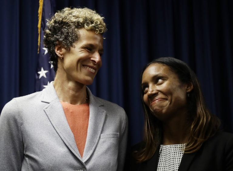 Montgomery County Assistant District Attorney Kristen Feden (right) and accuser Andrea Constand react at a news conference after Bill Cosby was sentenced to three to 10 years for sexual assault Tuesday, Sept. 25, 2018, in Norristown, Pa.