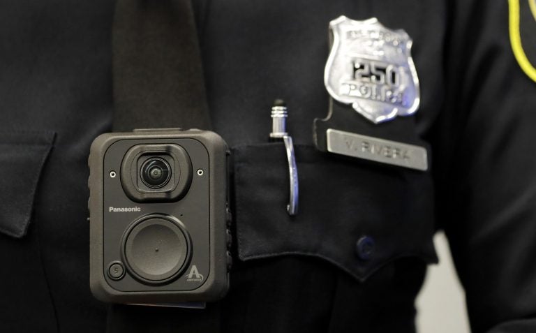 FILE -  In this April 26, 2017 file photograph, a Newark, N.J. police officer displays how a body cam is worn during a news conference in Newark. (AP Photo/Julio Cortez, File)