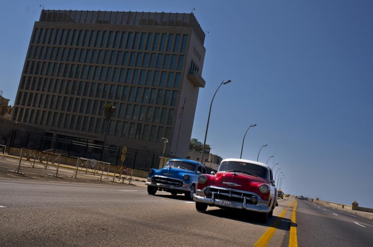 Cars drive passt the United States Embassy in Havana, Cuba, Friday, March 2, 2018. Citing mysterious 