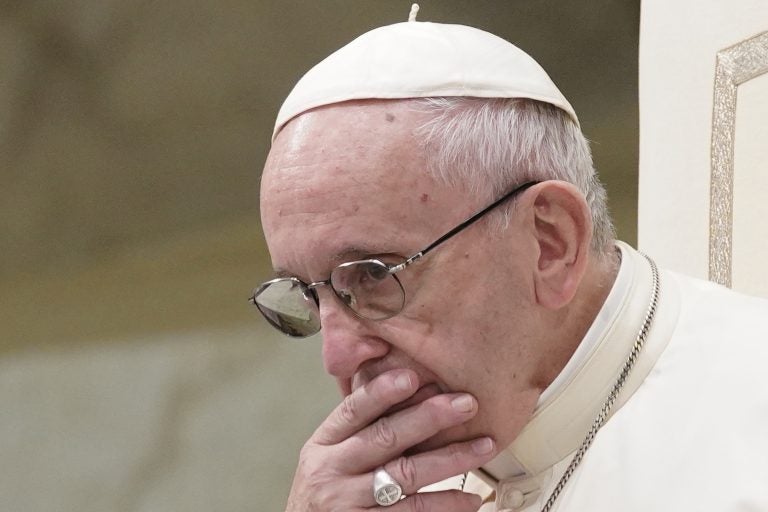 In this Aug. 22, 2018 file photo, Pope Francis is caught in pensive mood during his weekly general audience in the Pope Paul VI hall, at the Vatican. Archbishop Carlo Maria Vigano, with his 11-page testimony, have thrown Francis' 5-year papacy into crisis. (Andrew Medichini/AP Photo)