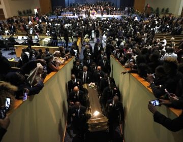 Pallbearers carry the casket out of Greater Grace Temple at the end of the funeral for Aretha Franklin, Friday, Aug. 31, 2018, in Detroit. Franklin died Aug. 16, 2018 of pancreatic cancer at the age of 76. (Jeff Roberson/AP Photo)