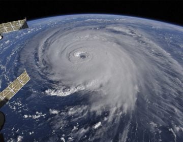 This image provided by NASA shows Hurricane Florence from the International Space Station on Wednesday, Sept. 12, 2018, as it threatens the U.S. East Coast. Hurricane Florence is coming closer and getting stronger on a path to squat over North and South Carolina for days, surging over the coast, dumping feet of water deep inland and causing floods from the sea to the Appalachian Mountains and back again.  (NASA via AP)