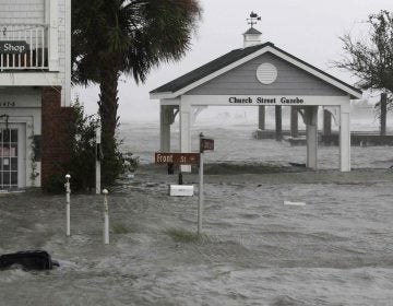 High winds and water surround buildings as Hurricane Florence hits Front Street in downtown Swansboro N.C., Friday, Sept. 14, 2018. (AP Photo/Tom Copeland)