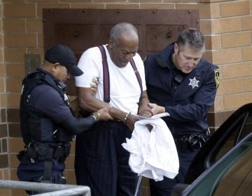 Bill Cosby is escorted out of the Montgomery County Correctional Facility, Tuesday Sept. 25, 2018, in Eagleville, Pa., following his sentencing to three-to-10-year prison sentence for sexual assault. (AP Photo/Jacqueline Larma)