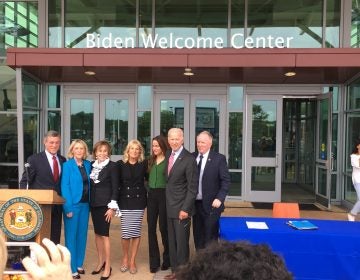 Former Vice President Joe Biden and his family join state leaders at the Delaware Welcome Center on I-95 near Newark Monday morning. The welcome center was renamed in the family's honor. (Mark Eichmann/WHYY)