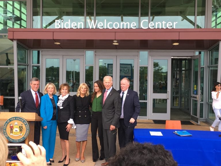 Former Vice President Joe Biden and his family join state leaders at the Delaware Welcome Center on I-95 near Newark Monday morning. The welcome center was renamed in the family's honor. (Mark Eichmann/WHYY)