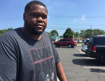 Derron Farmer sees plastic bags  as a necessary evil. (Aaron Moselle/WHYY)