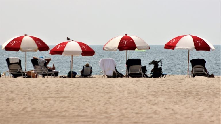 Beach goers taking in the sun. (Bill Barlow/for WHYY)