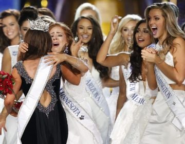 Miss North Dakota Cara Mund is congratulated by contestants after being named Miss America during Miss America 2018 pageant, Sunday, Sept. 10, 2017, in Atlantic City, N.J.