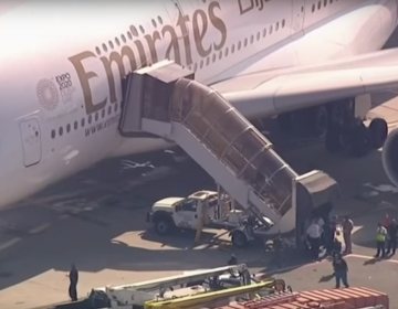 Plane lands at JFK with dozens of sick passengers (AP video)