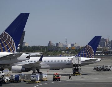 Workers at Newark Liberty International Airport are getting a wage boost starting Nov. 1, the Port Authority Board of Commissioners announced Thursday. (Julio Cortez/AP)