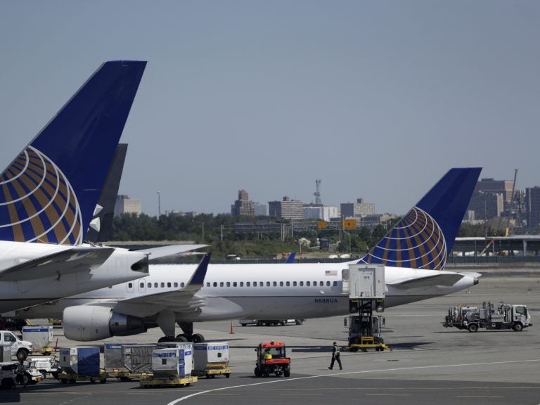 Workers at Newark Liberty International Airport are getting a wage boost starting Nov. 1, the Port Authority Board of Commissioners announced Thursday. (Julio Cortez/AP)