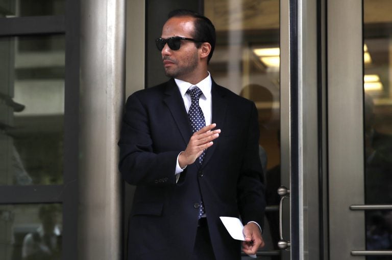Former Trump campaign aide George Papadopoulos, whose actions triggered the Russia investigation, leaves federal court after he was sentenced to 14 days in prison on Friday. He had pleaded guilty to lying to the FBI. (Jacquelyn Martin/AP)