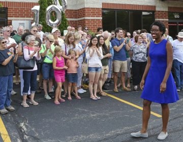 In this July 29, 2018, photo, rookie Democratic candidate Lauren Underwood greets supporters at the opening of her campaign office in St. Charles, Ill., 100 days before the midterm election. (Teresa Crawford/AP)