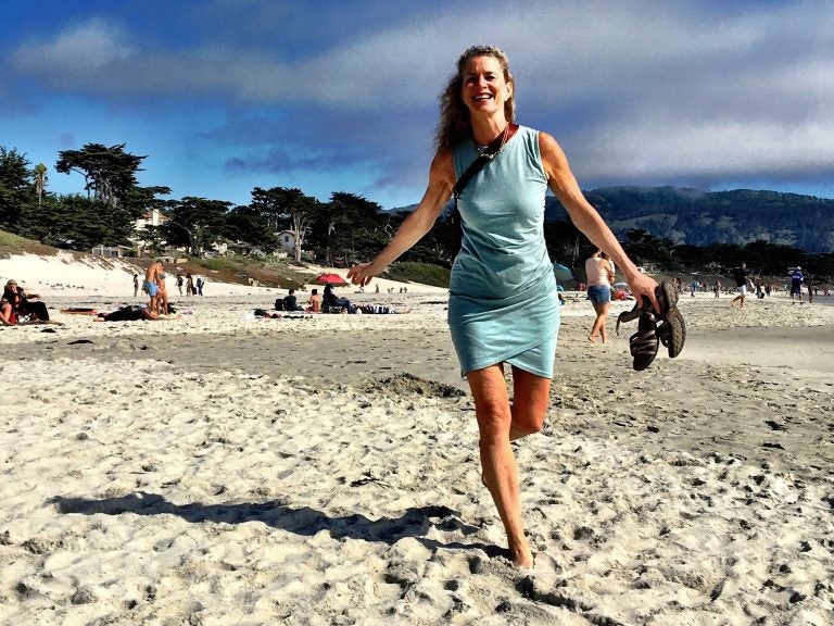 Barbara Paulsen, 59, runs on a beach in Carmel, California. She plans to do everything she can to stay active as she ages. (Teo Furtado)