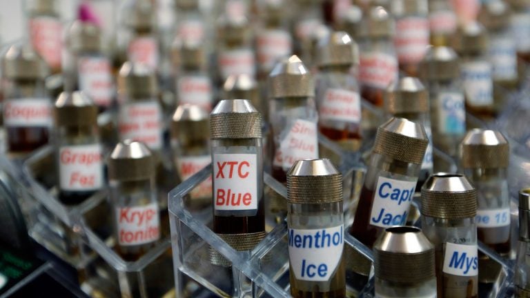 Vials of flavored liquid at a store selling electronic cigarettes and related items in Los Angeles. (AP Photo/Reed Saxon, File)

