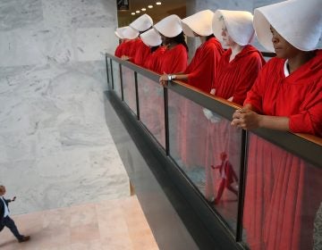 Protesters dressed as characters from The Handmaid's Tale outside the confirmation hearing for Brett Kavanaugh on Tuesday.