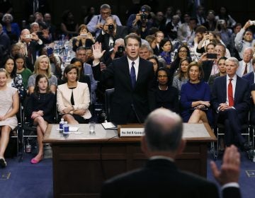 Supreme Court nominee Judge Brett Kavanaugh is sworn in by committee Chairman Chuck Grassley, R-Iowa, to testify during his confirmation hearing on Capitol Hill Tuesday in Washington, D.C.
