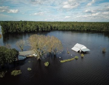 A flooded farm stands next to the Lumber River on Monday in this aerial photograph taken after Hurricane Florence hit Lumberton, N.C. (Charles Mostoller/Bloomberg /Bloomberg via Getty Images)