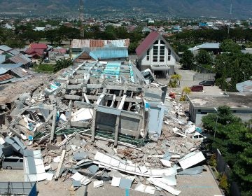 This aerial picture shows the remains of a 10-story hotel in Palu in Indonesia's Central Sulawesi on Sunday. (Azwar/AFP/Getty Images)