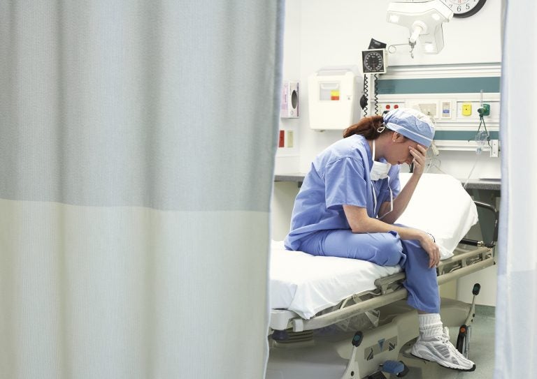 Physicians face long hours, frustrating paperwork and sometimes difficult patients. But researchers aren't so clear on whether burnout is the right word to describe their problems. (ERproductions Ltd/Blend Images/Getty Images)