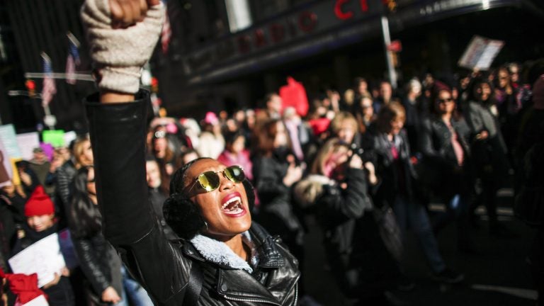 A woman shouts slogans during the Women's March in New York City, January 20, 2018, as protestors took to the streets en masse across the United States. (Kena Betancur/AFP/Getty Images)