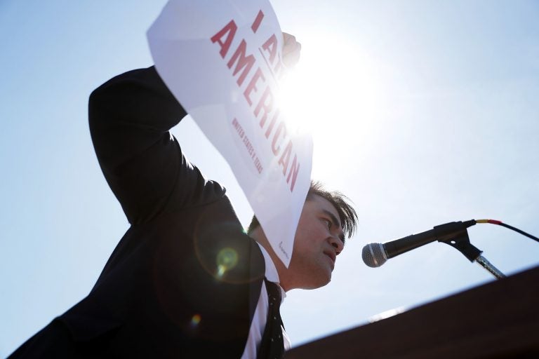 Jose Antonio Vargas, pictured at a rally in front of the U.S. Supreme Court in 2016, has written a memoir of his life as an undocumented immigrant in Dear America. (Alex Wong/Getty Images)