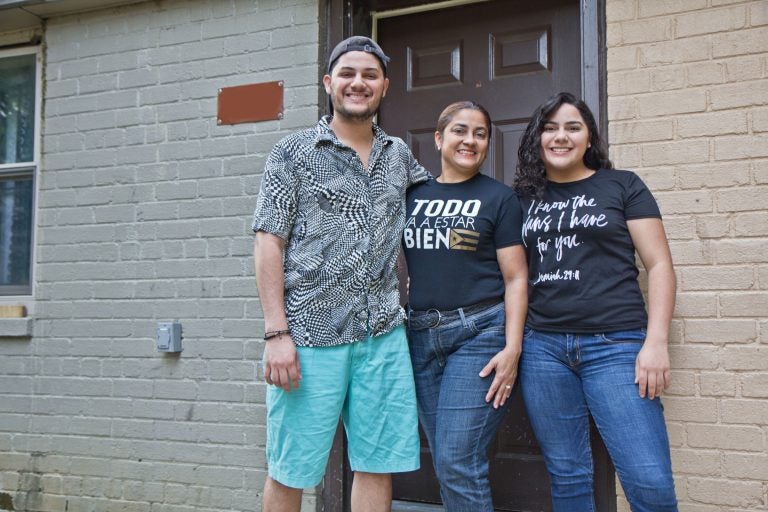 Lydia Adorno and her children Brian and Diane at their new apartment in North Philadelphia. They evacuated Puerto Rico after hurricane Maria. (Kimberly Paynter/WHYY)