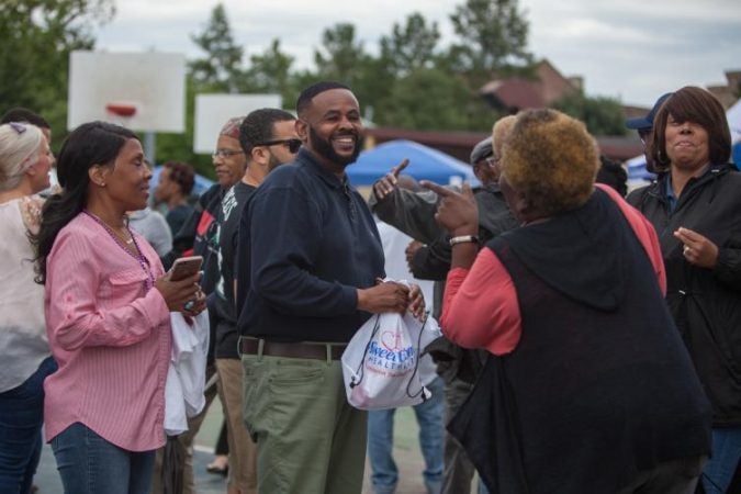 Councilman Curtis Jones (center) came out for Strawberry Mansion Day. (Emily Cohen for WHYY)