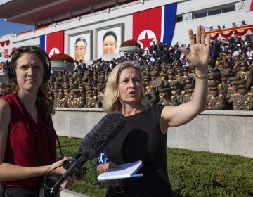 All Things Considered host Mary Louise Kelly (right) records a standup with producer Becky Sullivan at Kim Il Sung Square in Pyongyang ahead of a military parade marking the 70th anniversary of North Korea's founding.
(David Guttenfelder/for NPR)