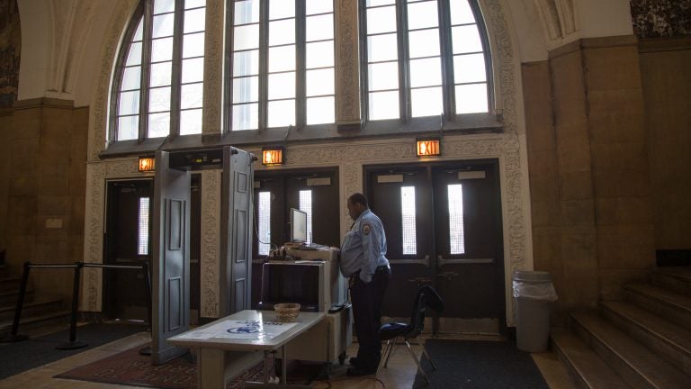 A metal detector and an x-ray machine sit at the entrance of Overbrook High School in Philadelphia. (Emily Cohen for WHYY, file)