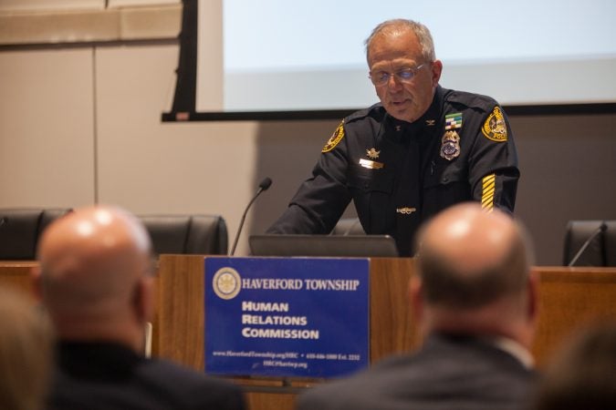 Chief John Viola, the Chief of the Haverford Township Police Department, addresses residents gathered together at the new Haverford Township Building. They met for a town hall to address racism and racial bias in the Haverford Township school district. (Emily Cohen for WHYY)