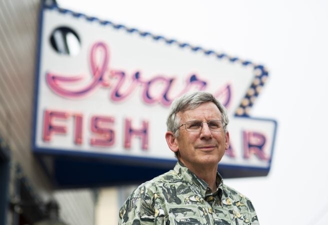 Bob Donegan, president of Ivar's, stands for a portrait outside the Ivar's Fish Bar on the waterfront on Wednesday, August 15, 2018 in Seattle, Washington. Ivar's is one of the local businesses affected by Seattle's Secure Scheduling Ordinance, which took effect in July 2017, aiming to establish more predictable work schedules for employees of large retail and food establishments. (Lindsey Wasson for the Inquirer)