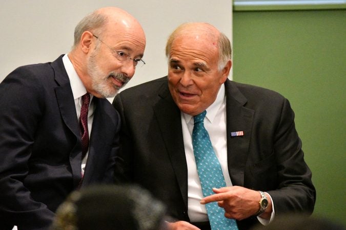 Gov. Tom Wolf and former Gov. Ed Rendell — both Democrats — chat ahead of the forum. (Bastiaan Slabbers for Keystone Crossroads)