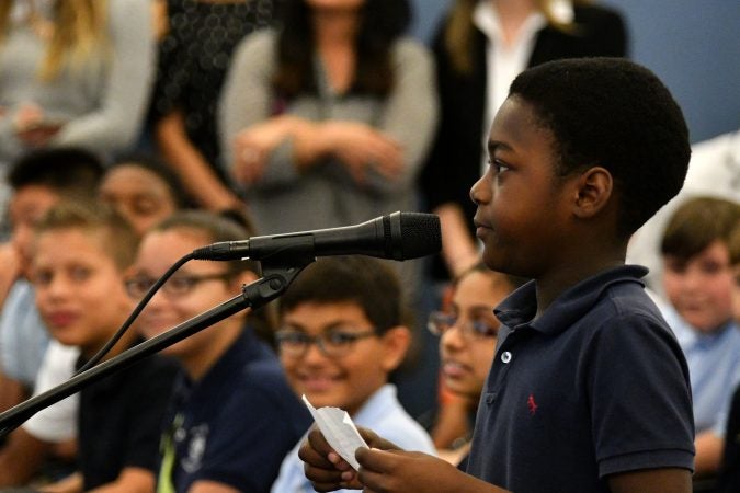 A student asks a question at a gubernatorial forum at the School District of Philadelphia's headquarters. (Bastiaan Slabbers for Keystone Crossroads)