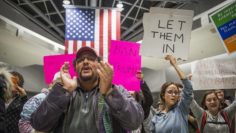 Protesters angered by President Donald Trump’s executive order that prevented refugees from entering the U.S. rally at Philadelphia International Airport in January 2017. (Branden Eastwood for WHYY, file)