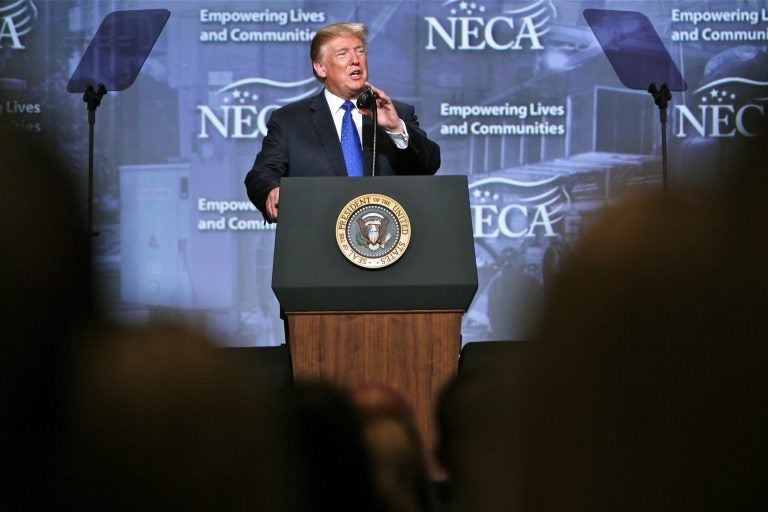 President Donald Trump addresses the National Electrical Contractors Association at the Pennsylvania Convention Center in Philadelphia.