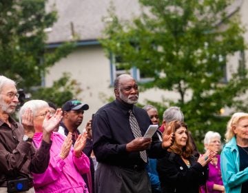 Attendees of a memorial service for the forgotten slaves buried on the grounds of Middletown Friends Meeting at Langhorne, Pa. on Saturday, Oct. 6, 2018. (Brad Larrison for WHYY)