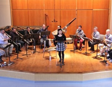 Members of Piffaro and the Prism Saxaphone Quartet rehearse David Ludwig's 