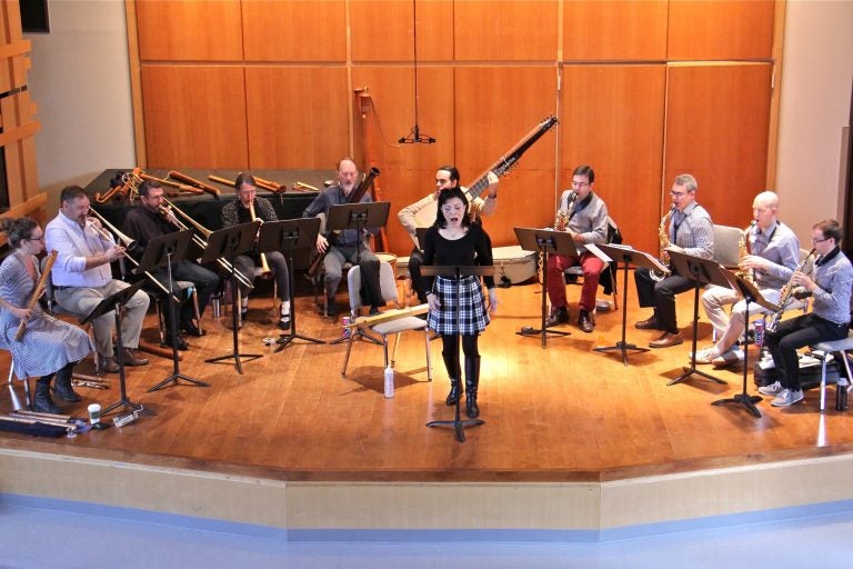 Members of Piffaro and the Prism Saxaphone Quartet rehearse David Ludwig's 