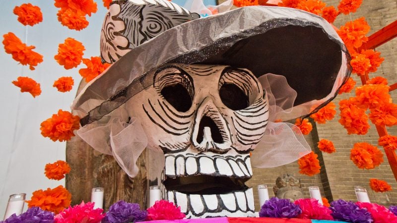 The centerpiece of the Day of the Dead alter at the Penn Museum was created by artist Cesar Viveros. (Kimberly Paynter/WHYY)