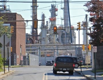 Main Street in Marcus Hook dead ends at the Monroe Energy refinery. (Emma Lee/WHYY)
